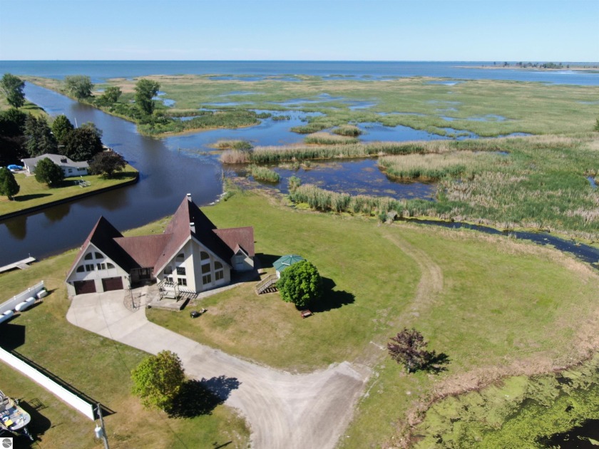 A fantastic waterfront property awaits with this beautiful - Beach Home for sale in Au Gres, Michigan on Beachhouse.com