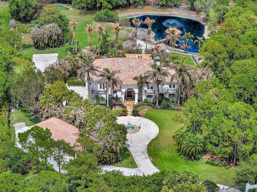 Serene. Secluded. Exclusive. Welcome to 2584 SE Ranch Acres - Beach Home for sale in Jupiter, Florida on Beachhouse.com