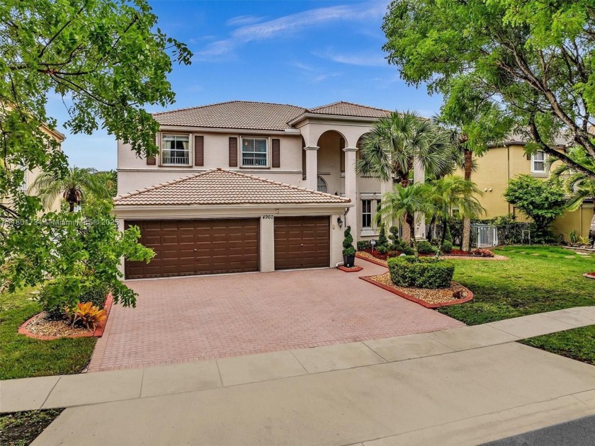 Stunning lakefront home! This 5-bed, 3-bath home offers - Beach Home for sale in Miramar, Florida on Beachhouse.com
