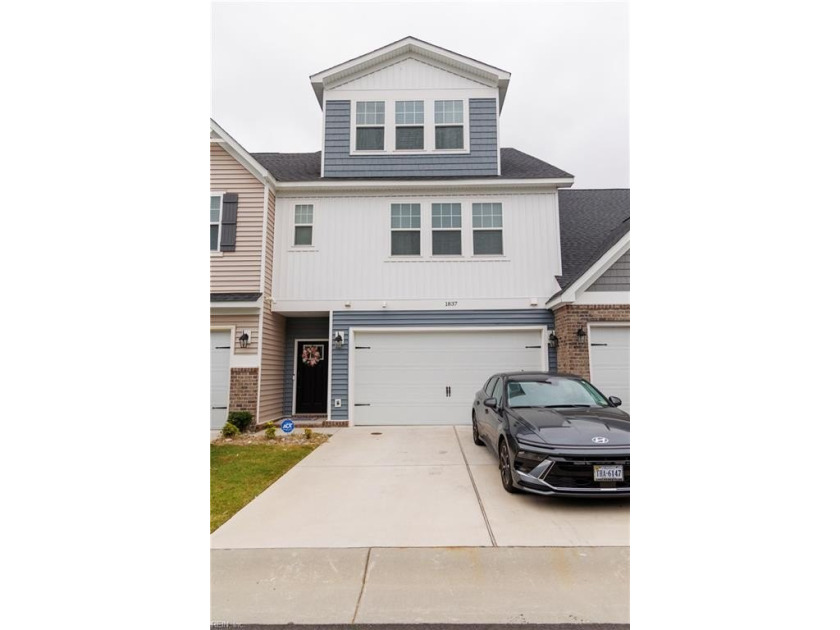Welcome to your dream home in the highly sought-after Grassfield - Beach Townhome/Townhouse for sale in Chesapeake, Virginia on Beachhouse.com