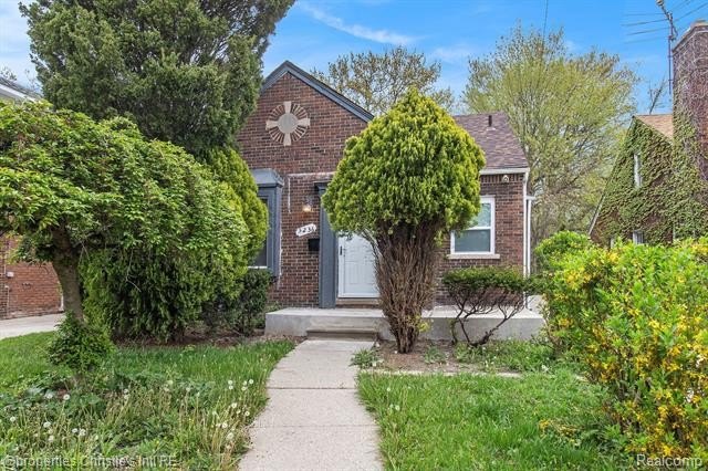 Discover the potential of this solid brick home nestled in the - Beach Home for sale in Detroit, Michigan on Beachhouse.com