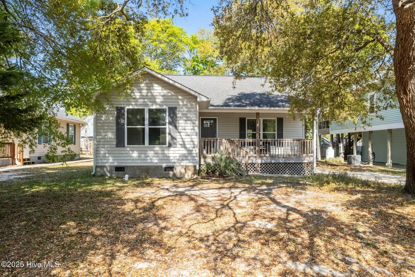 Introducing the cutest beach cottage! This 3-bedroom, 2-bathroom - Beach Home for sale in Oak Island, North Carolina on Beachhouse.com
