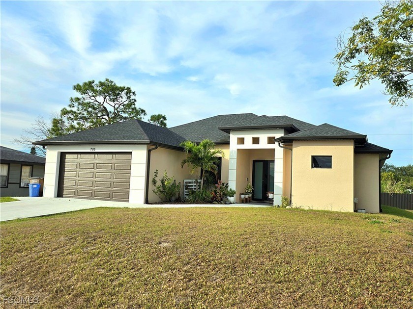 City water sets this well-located 3-bedroom, 3-bath home apart - Beach Home for sale in Lehigh Acres, Florida on Beachhouse.com