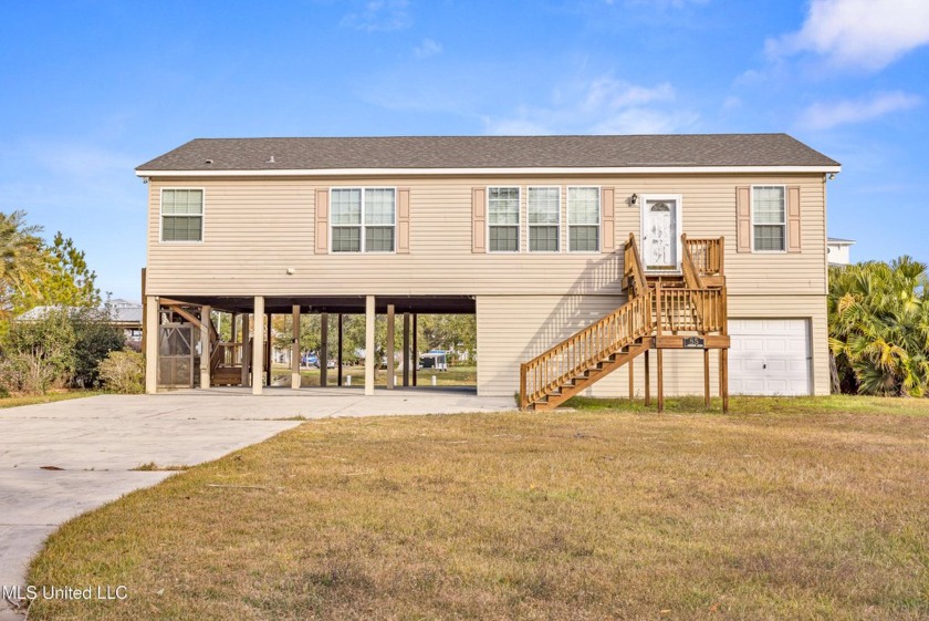 Welcome to your perfect waterfront retreat! This 3-bedroom - Beach Home for sale in Bay Saint Louis, Mississippi on Beachhouse.com