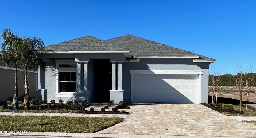 This brand new, never lived-in, home sits on a water view - Beach Home for sale in Palm Coast, Florida on Beachhouse.com