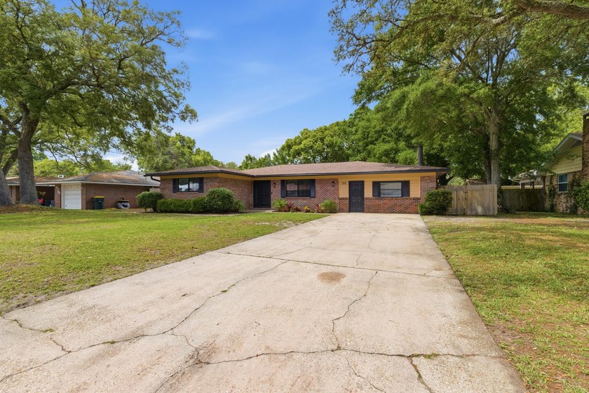 Welcome to 215 Sotir Street, a beautifully updated residence in - Beach Home for sale in Fort Walton Beach, Florida on Beachhouse.com