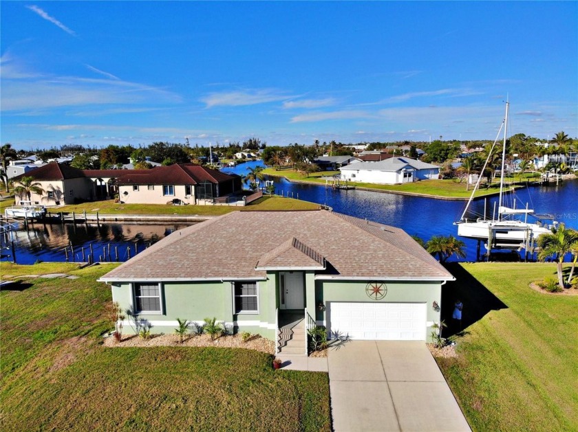 **LOCATION MATTERS**FIVE INTERSECTING CANALS CONVERGE ON AN OPEN - Beach Home for sale in Punta Gorda, Florida on Beachhouse.com