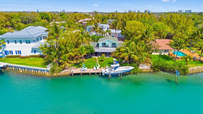 Discover Your Hidden Paradise! This charming riverfront property - Beach Home for sale in Jupiter, Florida on Beachhouse.com