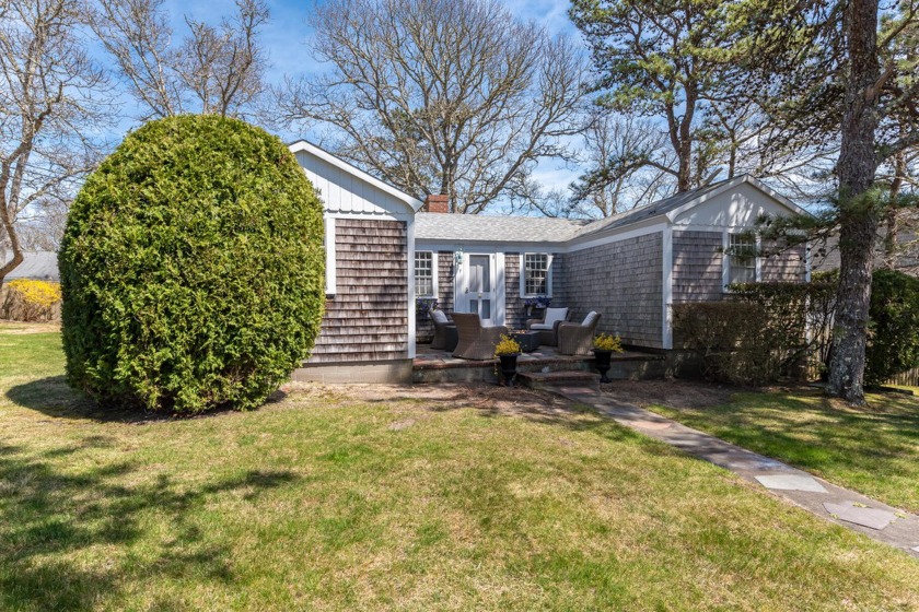 This classic beach bungalow, nestled on a picturesque tree-lined - Beach Home for sale in West Harwich, Massachusetts on Beachhouse.com