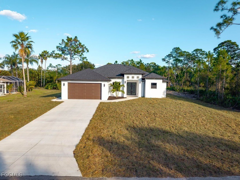 Discover this stunning, newly built home designed for modern - Beach Home for sale in Lehigh Acres, Florida on Beachhouse.com