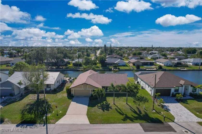 Introducing this charming 3-bedroom, 2-bathroom home in - Beach Home for sale in Cape Coral, Florida on Beachhouse.com