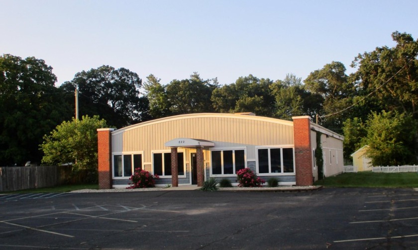 This 4,200 SF office building is located on highly traveled - Beach Commercial for sale in Spring Lake, Michigan on Beachhouse.com