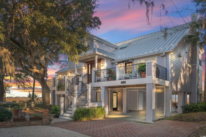 This magnificent .74 acre inlet/creek-front estate consists of - Beach Home for sale in Murrells Inlet, South Carolina on Beachhouse.com