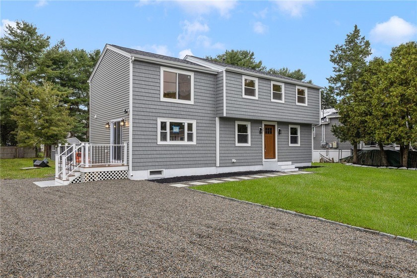 This beautifully reimagined 4 bedroom Colonial has been - Beach Home for sale in South Kingston, Rhode Island on Beachhouse.com