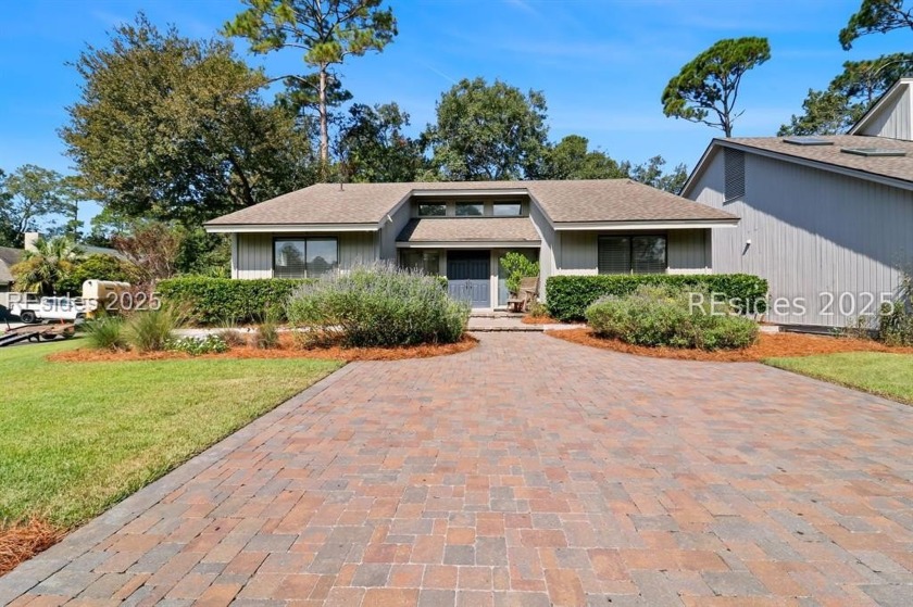 Tucked away in the private Club Course area of Sea Pines, this - Beach Home for sale in Hilton Head Island, South Carolina on Beachhouse.com