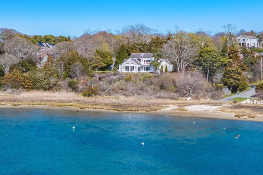 Elevated above the serene waters of Town Cove and adjacent to - Beach Home for sale in Orleans, Massachusetts on Beachhouse.com