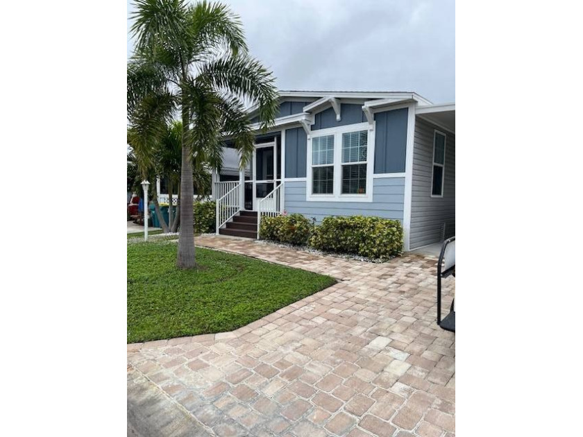 Imagine a serene property nestled in a vagrant 55+ community - Beach Home for sale in Melbourne, Florida on Beachhouse.com