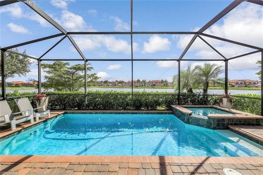 Impeccably maintained, resting on a large lake with coveted - Beach Home for sale in Naples, Florida on Beachhouse.com