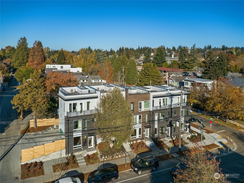 This is Green Lake living at its finest!! Each townhome in this - Beach Home for sale in Seattle, Washington on Beachhouse.com