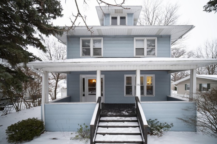 Stately 3 unit on beautiful Ludington Avenue. Could easily be - Beach Lot for sale in Ludington, Michigan on Beachhouse.com