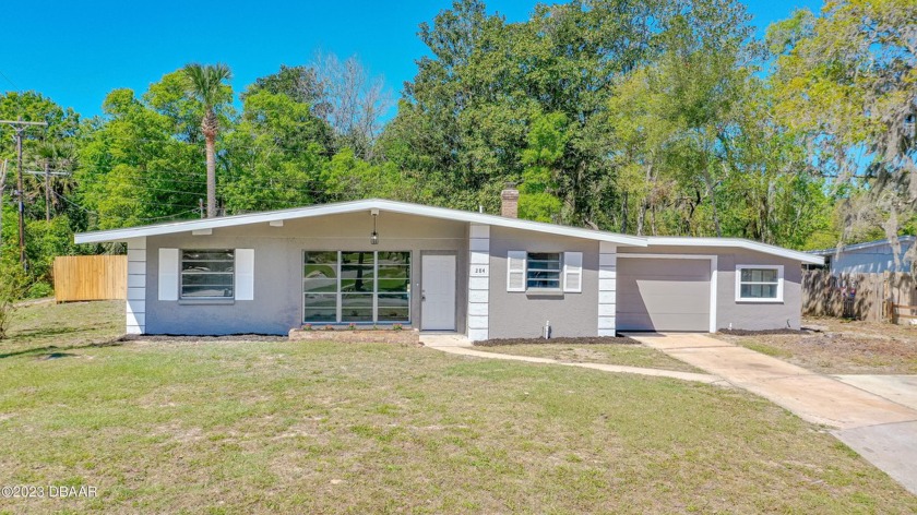 NEW NEW NEW! This beautiful POOL home sits on .71 acres in the - Beach Home for sale in Ormond Beach, Florida on Beachhouse.com