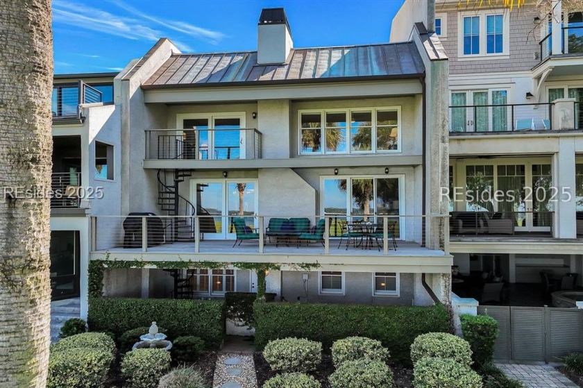 Situated on the 18th fairway of Harbour Town Golf Links, this - Beach Home for sale in Hilton Head Island, South Carolina on Beachhouse.com
