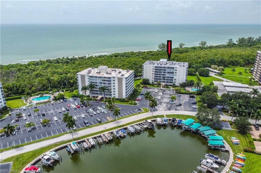 Bay & Marina Views from your spacious lanai opening to the - Beach Home for sale in Naples, Florida on Beachhouse.com