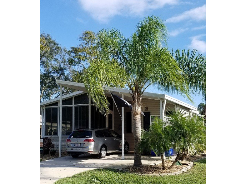 A well loved and carefully maintained home with lush tropical - Beach Home for sale in Ormond Beach, Florida on Beachhouse.com