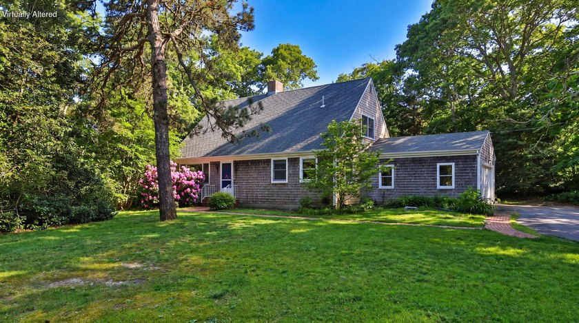 Tucked away on a quiet street in one of E. Orleans' lovely - Beach Home for sale in Orleans, Massachusetts on Beachhouse.com