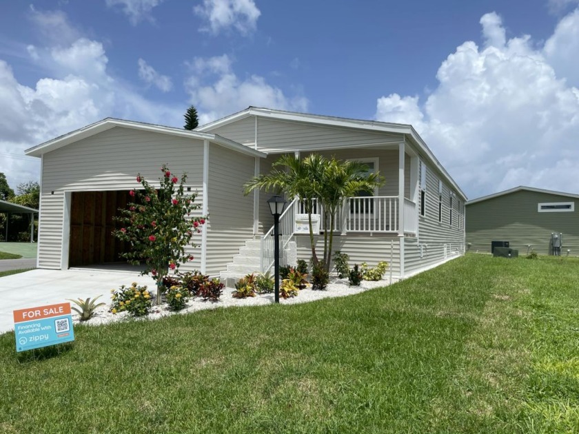 Palm Lake Estates has this gorgeous Corner Lot home. Home - Beach Home for sale in Riviera Beach, Florida on Beachhouse.com