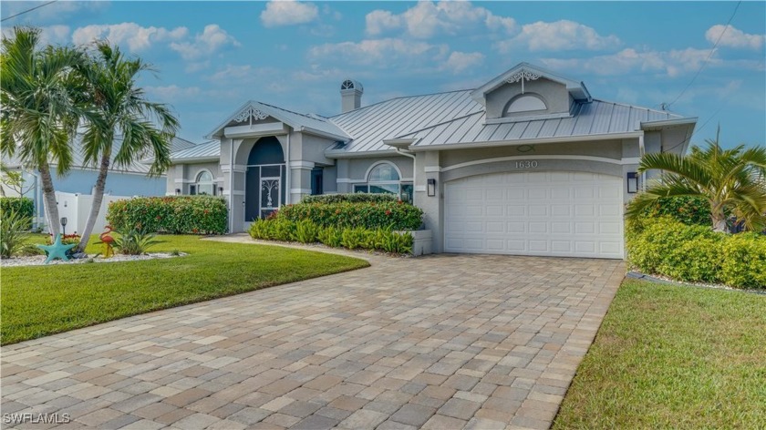 Stunning SAILBOAT ACCESS Home with Exceptional Upgrades. This - Beach Home for sale in Cape Coral, Florida on Beachhouse.com