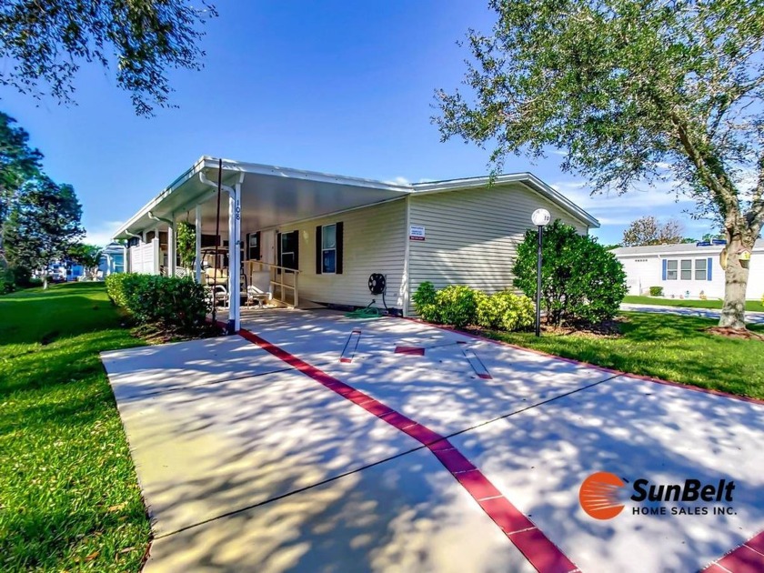 This 2004 Homes of Merit has 2-bedrooms and 2-full baths, with - Beach Home for sale in Ormond Beach, Florida on Beachhouse.com