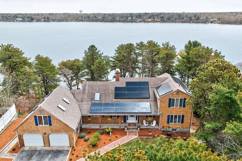 Beautiful waterfront home on Long Pond in Harwich with a sandy - Beach Home for sale in Harwich, Massachusetts on Beachhouse.com