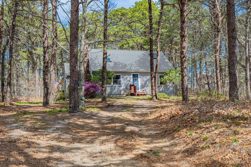 Tucked away on .56 private acres abutting conservation land - Beach Home for sale in Eastham, Massachusetts on Beachhouse.com