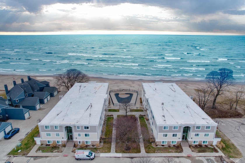 LAKE MICHIGAN BEACHFRONT! Ground-floor condo facing Lake - Beach Condo for sale in South Haven, Michigan on Beachhouse.com