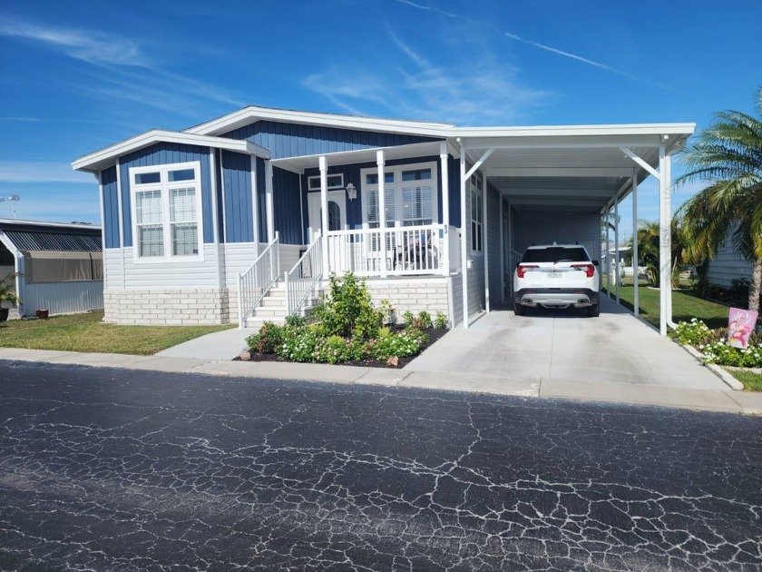 Welcome to this phenomenal manufactured home in a fabulous 55+ - Beach Home for sale in Largo, Florida on Beachhouse.com