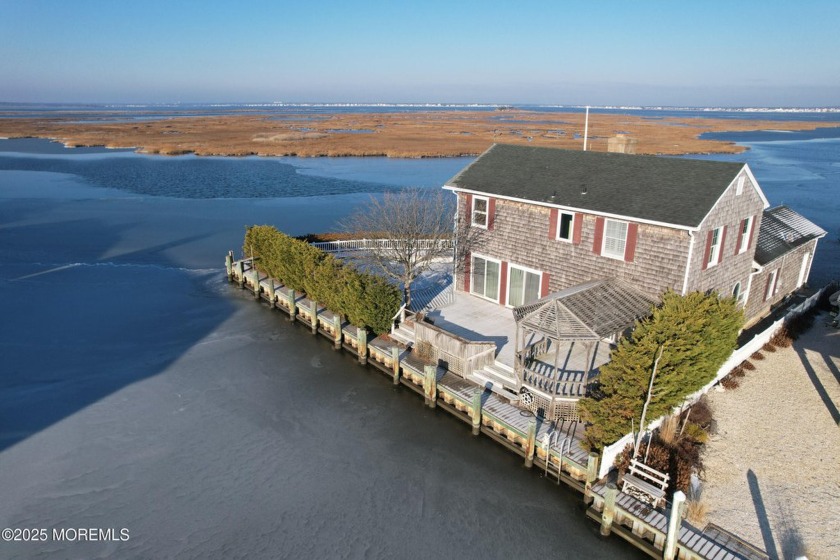 This two-story waterfront retreat boasts panoramic views that - Beach Home for sale in Lavallette, New Jersey on Beachhouse.com