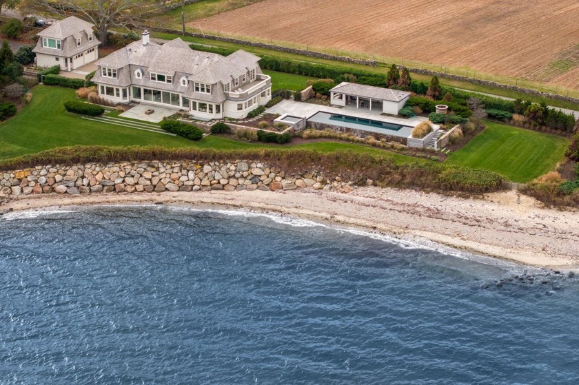 This sensational oceanfront estate is located in the coveted - Beach Home for sale in Dartmouth, Massachusetts on Beachhouse.com