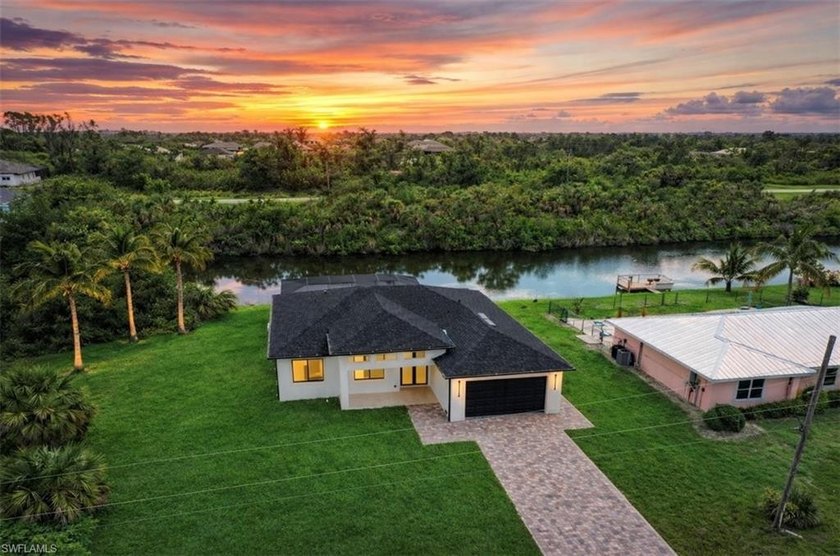 An exceptional waterfront residence where elegance, comfort, and - Beach Home for sale in Port Charlotte, Florida on Beachhouse.com