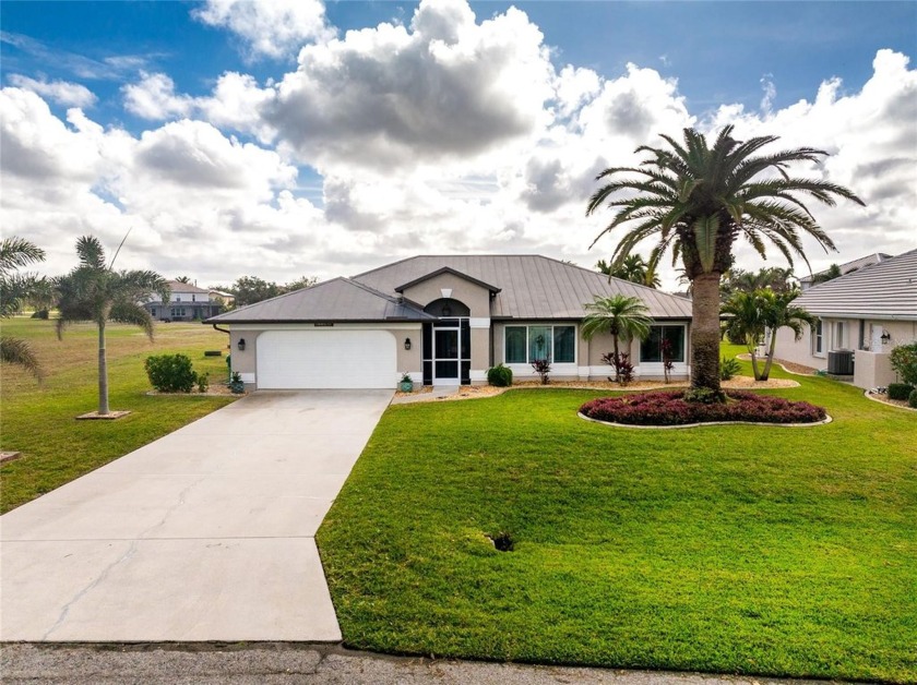 Located on a tranquil street in the deed restricted community of - Beach Home for sale in Punta Gorda, Florida on Beachhouse.com