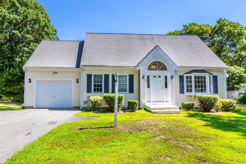 Welcome to this charming Cape-style home nestled in the - Beach Home for sale in East Falmouth, Massachusetts on Beachhouse.com