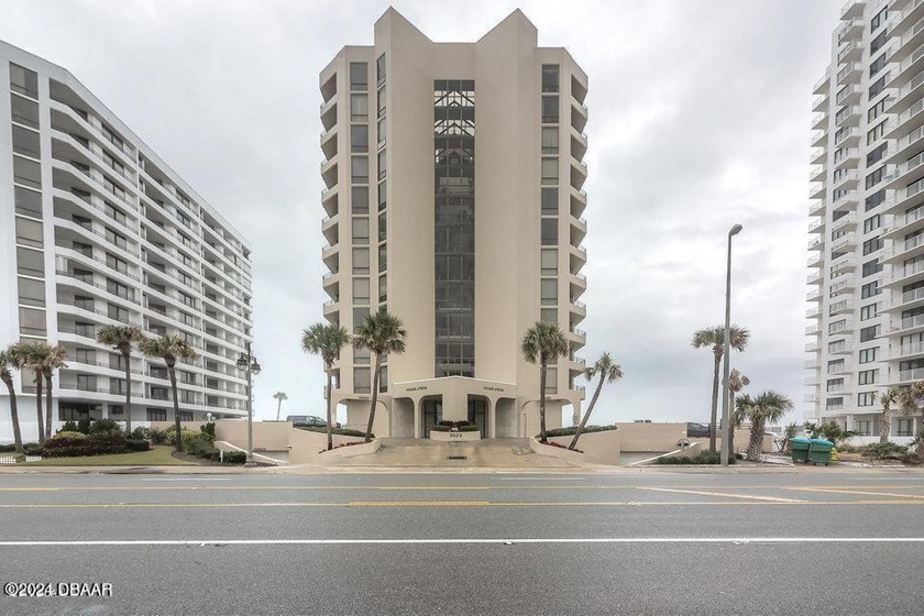 Oceans Atrium has a charm all of its own.  Meet for a beverage - Beach Condo for sale in Daytona Beach Shores, Florida on Beachhouse.com