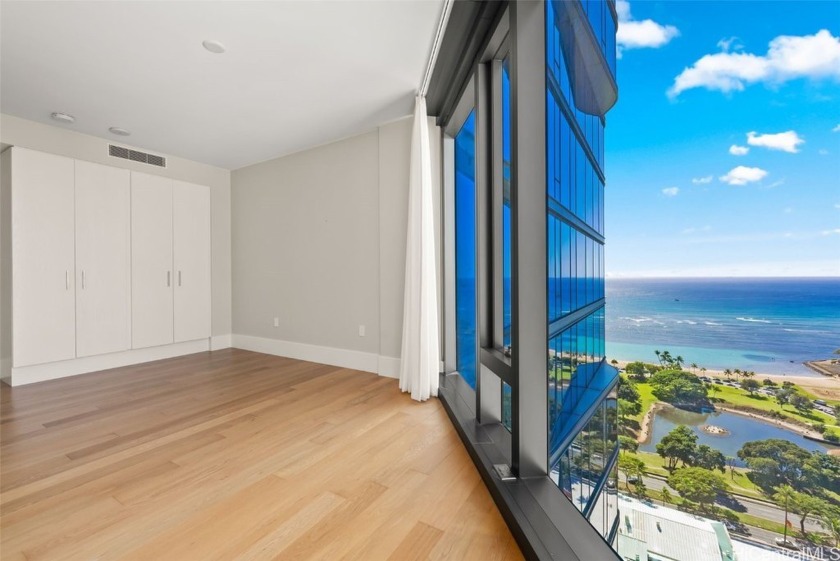 This upgraded unit boasts high-end finishes, including automated - Beach Condo for sale in Honolulu, Hawaii on Beachhouse.com