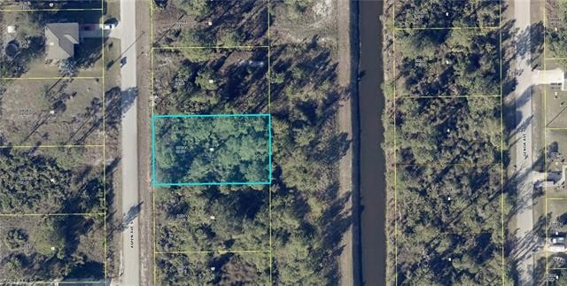 CANAL LOT WITH LARGE EASEMENT IN THE BACK BEFORE THE CANAL FOR - Beach Lot for sale in Lehigh Acres, Florida on Beachhouse.com