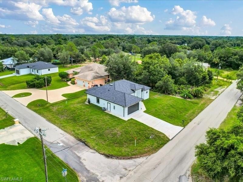 Stunning new construction home perfectly positioned on an - Beach Home for sale in Lehigh Acres, Florida on Beachhouse.com