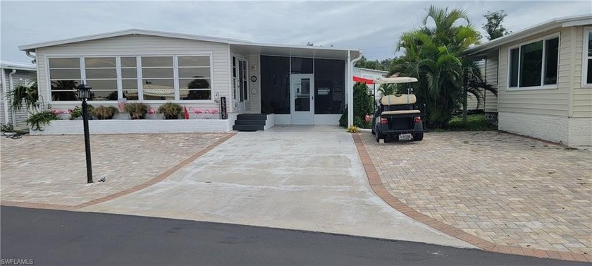 Move in Ready, Many upgrades, long canal view with sunset views - Beach Home for sale in Bonita Springs, Florida on Beachhouse.com