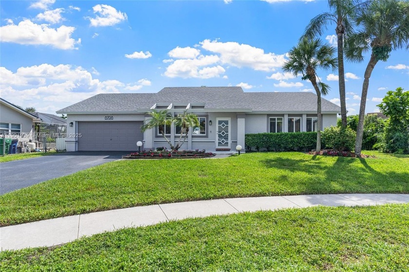 Enjoy peace of mind from day one with a brand-new roof and - Beach Home for sale in Cooper City, Florida on Beachhouse.com