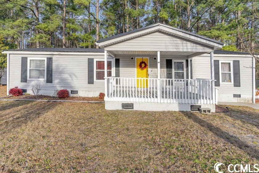 This fully furnished, 4 bedroom, 2 bathroom manufactured home - Beach Home for sale in Little River, South Carolina on Beachhouse.com