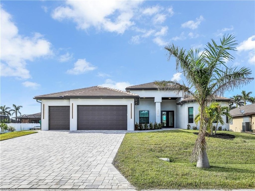 This stunning new construction sits on a triple lot and boasts 4 - Beach Home for sale in Cape Coral, Florida on Beachhouse.com