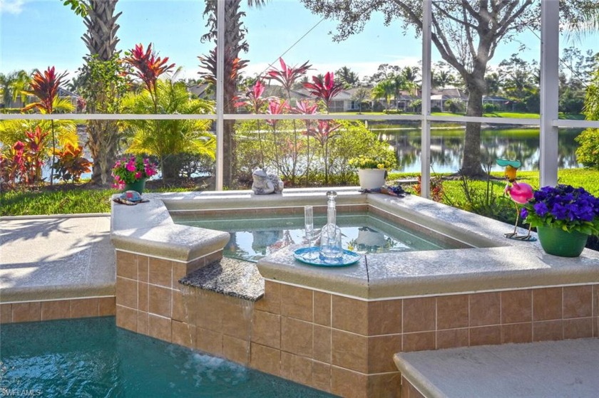 Absolutely Pristine Oakmont!  SW Exposure, Lake View, Pool, Spa - Beach Home for sale in Naples, Florida on Beachhouse.com